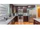 Updated kitchen features stainless steel appliances and granite countertops at 607 Green Briar Blvd, Altamonte Springs, FL 32714