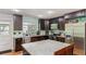 Updated kitchen with stainless steel appliances and granite countertops at 607 Green Briar Blvd, Altamonte Springs, FL 32714