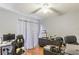 Home office features a ceiling fan, hardwood floors and computer at 607 Green Briar Blvd, Altamonte Springs, FL 32714