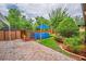 Backyard featuring a brick paver patio, storage shed, and above-ground swimming pool at 6430 Yellowstone St, Orlando, FL 32807