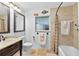 Neutral bathroom featuring a vanity with a stone countertop, a toilet, and a shower-tub combination at 6430 Yellowstone St, Orlando, FL 32807