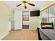 Light and airy dining area with hardwood floors, and features additional storage space in the pantry at 6430 Yellowstone St, Orlando, FL 32807