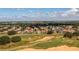 Aerial view of neighborhood featuring a lush golf course at 7398 Gathering Ct, Reunion, FL 34747