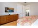 Relaxing bedroom includes a dresser, closet, and TV for entertainment and plenty of storage at 7398 Gathering Ct, Reunion, FL 34747