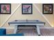 Ping pong table adds fun to bonus room with creative lighting and wall art at 7398 Gathering Ct, Reunion, FL 34747