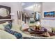 View of a luxurious living room with a staircase leading to the second floor at 7398 Gathering Ct, Reunion, FL 34747
