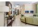 Well decorated living room with tile floors and lots of natural light at 7398 Gathering Ct, Reunion, FL 34747