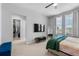 Bright bedroom with large windows, walk-in closet, and a modern style and color scheme at 8427 Modiano St, Orlando, FL 32827