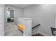 Upstairs hallway showcases an access to bedrooms, carpet floors and a modern aesthetic at 8427 Modiano St, Orlando, FL 32827