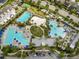 Aerial view showcasing multiple community pools and recreational area at 8427 Modiano St, Orlando, FL 32827