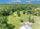 Expansive lot with mature trees and well-maintained grassy areas at 2508 Fawn Run, Oviedo, FL 32765