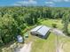 Aerial view of a well-maintained barn with trailer parking at 2508 Fawn Run, Oviedo, FL 32765
