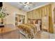 Bedroom featuring a bed, a dresser, a closet, and a decorative headboard at 2508 Fawn Run, Oviedo, FL 32765