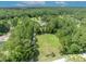 Aerial view of the property showing a large open grass-covered field at 2508 Fawn Run, Oviedo, FL 32765