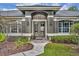 Stunning front entrance with double doors, decorative glass, and inviting walkway at 2508 Fawn Run, Oviedo, FL 32765