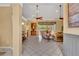 Spacious living room with tile flooring, fan, and a view of screened-in patio at 2508 Fawn Run, Oviedo, FL 32765