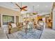 Expansive living room with comfortable sofas, ceiling fans, and open floor plan at 2508 Fawn Run, Oviedo, FL 32765