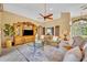 Inviting living room with tile floors, comfortable furniture, and entertainment center at 2508 Fawn Run, Oviedo, FL 32765