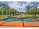 View of the screened-in pool and waterfall feature from a distance at 2508 Fawn Run, Oviedo, FL 32765