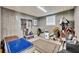 The tack room with saddle and riding equipment storage with a window at 2508 Fawn Run, Oviedo, FL 32765