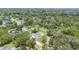 Lush property featuring mature landscaping, with a sparkling pool and manicured grounds at 102 Linda Ln, Lake Mary, FL 32746