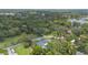 Secluded retreat featuring a pool and surrounded by lush greenery near tranquil lakes at 102 Linda Ln, Lake Mary, FL 32746