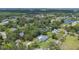 Idyllic neighborhood featuring mature trees, with a sparkling pool nestled in the backyard at 102 Linda Ln, Lake Mary, FL 32746