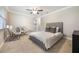 Cozy bedroom features a comfortable bed, plush chairs, and ample natural light at 102 Linda Ln, Lake Mary, FL 32746