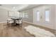 Cozy dining space featuring modern decor, tile floors, and a stylish table setting at 102 Linda Ln, Lake Mary, FL 32746