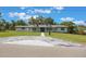 Charming home with a manicured lawn, a modern driveway, and symmetrical landscaping at 102 Linda Ln, Lake Mary, FL 32746