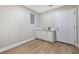 Convenient laundry room with sink, storage cabinets, and access to the exterior at 102 Linda Ln, Lake Mary, FL 32746