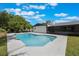 Inviting swimming pool with patio area, surrounded by a well-manicured lawn at 102 Linda Ln, Lake Mary, FL 32746