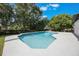Beautiful private backyard oasis with a sparkling pool and lush landscaping at 102 Linda Ln, Lake Mary, FL 32746