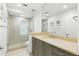 Well-lit bathroom with a glass-enclosed shower and sleek vanity at 10209 Trout Rd, Orlando, FL 32836
