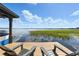 Dock chairs overlooking calm lake waters at 10209 Trout Rd, Orlando, FL 32836