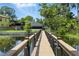 View of the home from the dock over the water at 10209 Trout Rd, Orlando, FL 32836