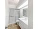 Bathroom with a modern vanity and sliding glass shower at 109 Greentree Ln, Yalaha, FL 34797