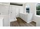 A spacious bathroom featuring a accessible bathtub, and glass shower at 109 Greentree Ln, Yalaha, FL 34797