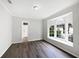 A bedroom featuring a bay window and ensuite bathroom at 109 Greentree Ln, Yalaha, FL 34797