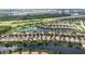 Community aerial view showcasing homes on the lake at 12286 Regal Lily Ln, Orlando, FL 32827