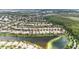 Expansive aerial view of a Primary-planned community with well-maintained homes surrounding a lake at 12286 Regal Lily Ln, Orlando, FL 32827