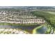 Expansive aerial view of a Primary-planned community with well-maintained homes surrounding a lake at 12286 Regal Lily Ln, Orlando, FL 32827
