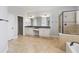 Bathroom with double vanity, white cabinets, tiled floor, and glass shower at 12286 Regal Lily Ln, Orlando, FL 32827