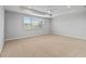 Bedroom with carpet, a ceiling fan, large window, and tray ceiling at 12286 Regal Lily Ln, Orlando, FL 32827