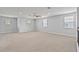 Spacious bonus room with carpet, ceiling fan, recessed lights, and multiple windows at 12286 Regal Lily Ln, Orlando, FL 32827