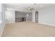 Large bonus room featuring carpet, a ceiling fan, and a staircase at 12286 Regal Lily Ln, Orlando, FL 32827