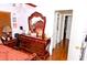 Bedroom featuring a decorative dresser, side table and neutral paint at 12406 Beacontree Way, Orlando, FL 32837