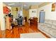 This living room features a fireplace, an office area, and hardwood floors at 12406 Beacontree Way, Orlando, FL 32837