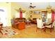 Inviting living room area with hardwood flooring and comfortable seating at 12406 Beacontree Way, Orlando, FL 32837