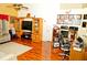 Spacious living room offering wood floors and an ideal space for a home office at 12406 Beacontree Way, Orlando, FL 32837